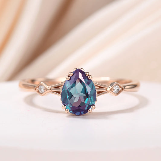 Minimalist 14K Rose Gold Three Stone Pear Shaped Alexandrite Engagement Ring With Square Accents