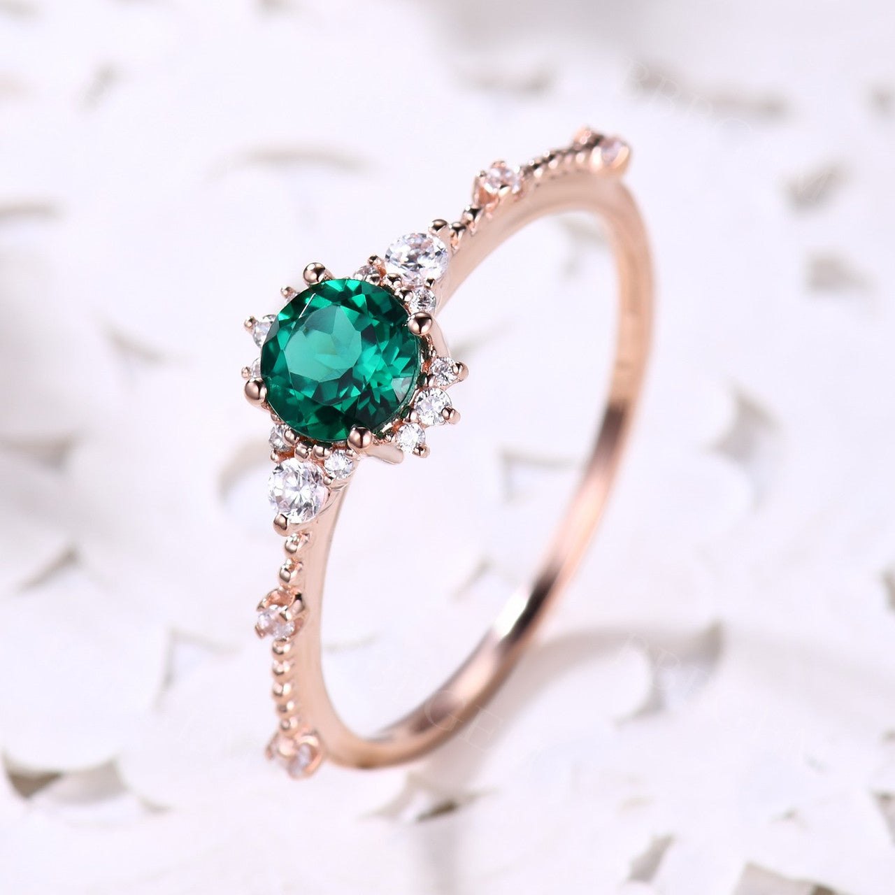 rose gold emerald ring